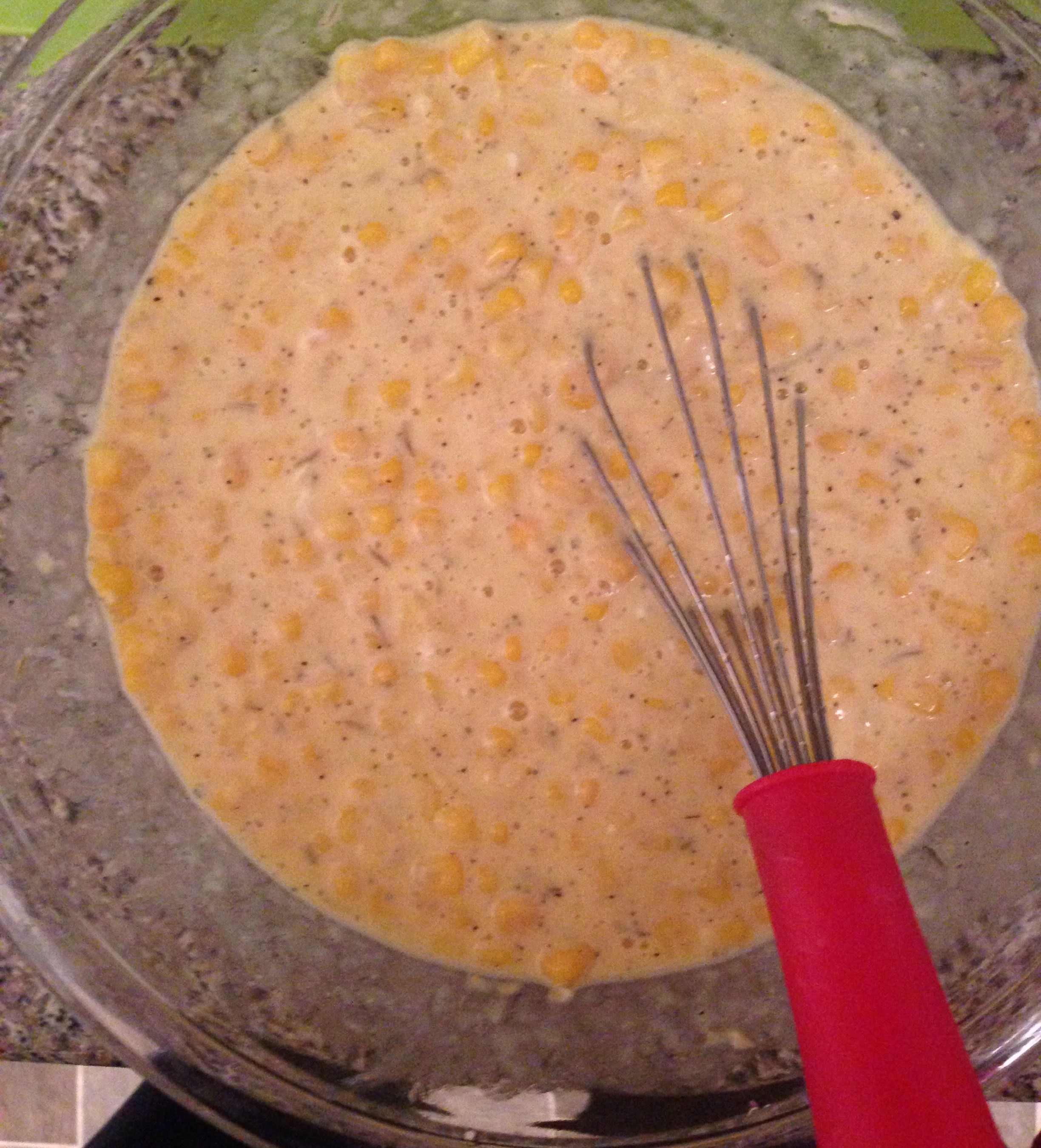 Adding corn and spices