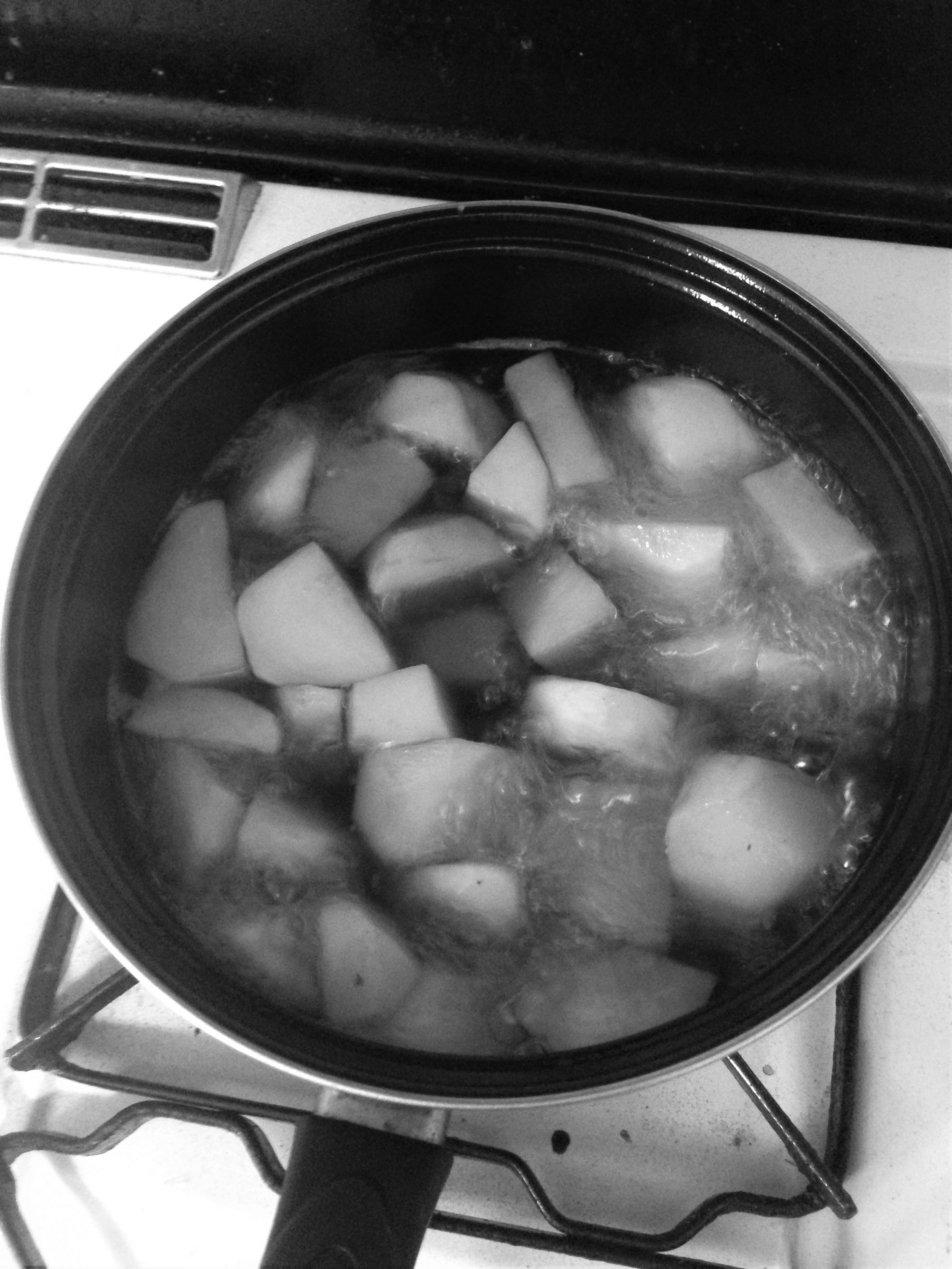 Boiling turnips (black and white)