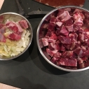 Chopped meat, bones, onions and garlic