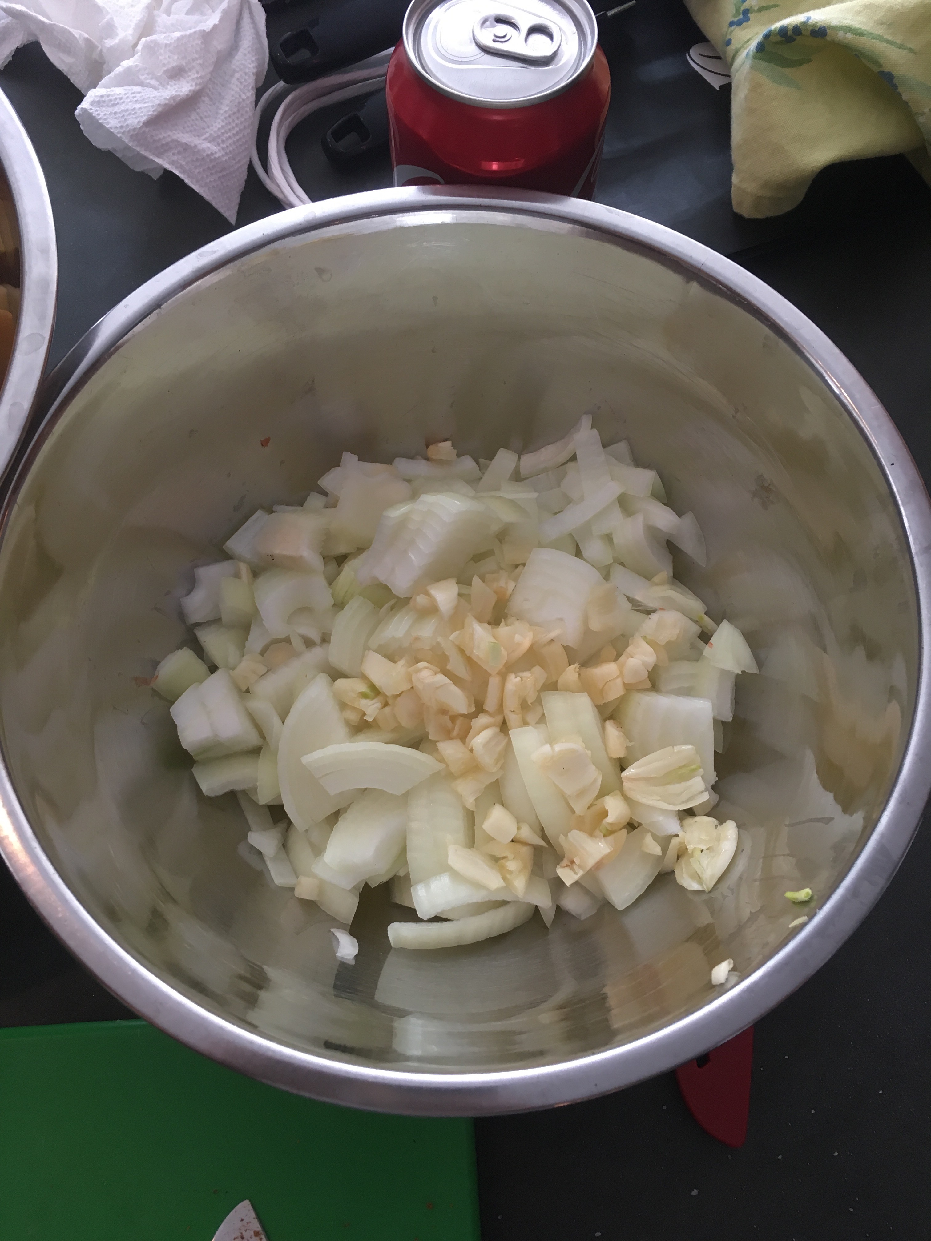 Chopped onions and garlic in a bowl