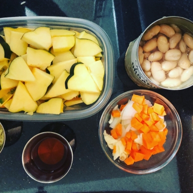 cut squash, beans, veggies, vinegar, spices