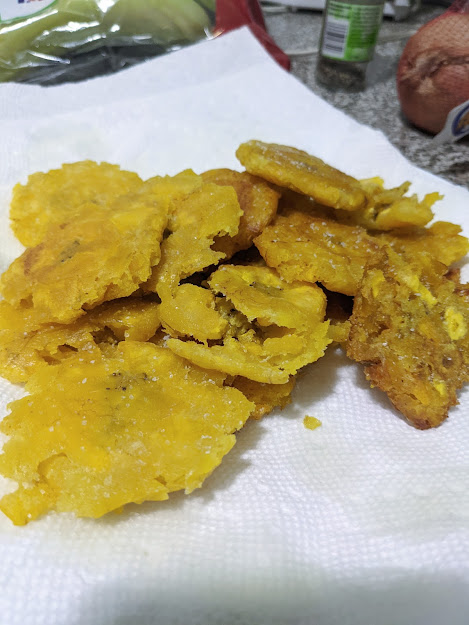 Tostones - fried green plantain - on paper towel